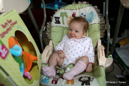 Ariella opening her first Christmas gift